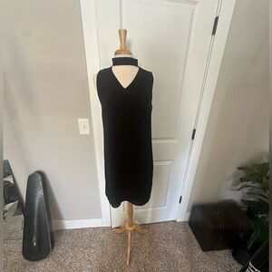 Classy LBD Black Sleeveless Dress. Flowy, lined, cutout neckline.Minimal Size 8